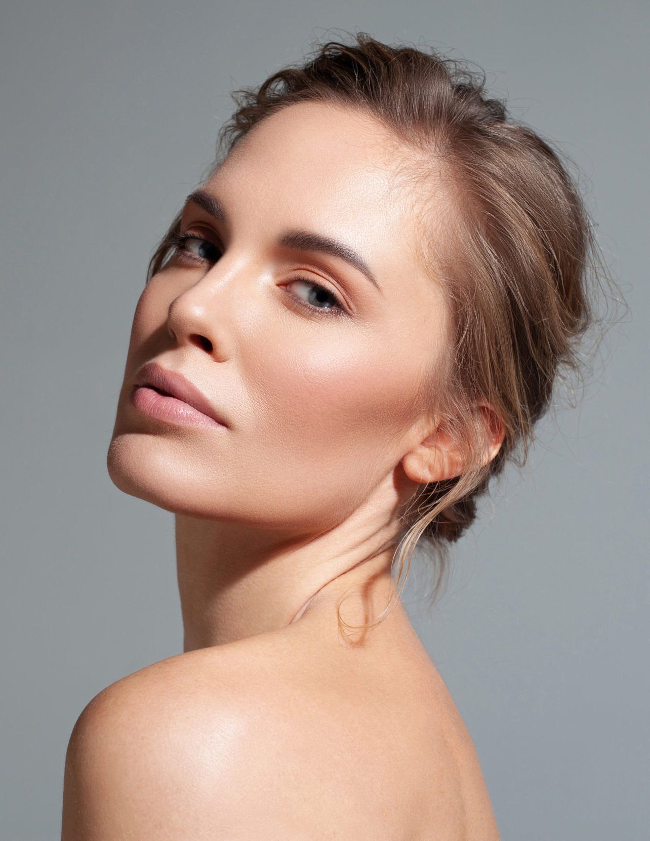 Woman with firm, lifted, healthy skin after XERF skin tightening at Skin Spa by Dr. Kia in Brentwood, Los Angeles
