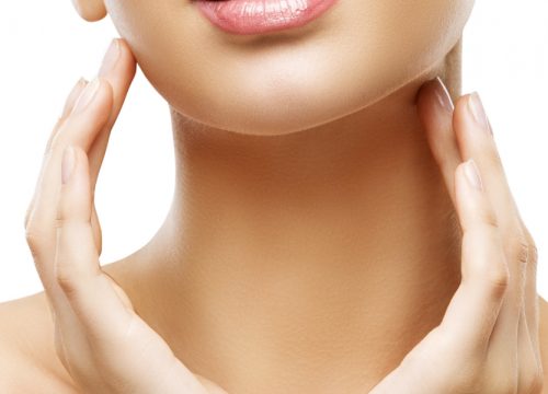 Close-up on a woman's submental area