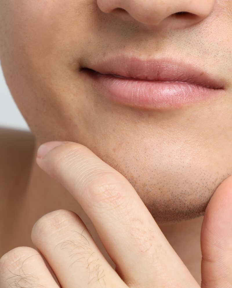 Man touching his chin