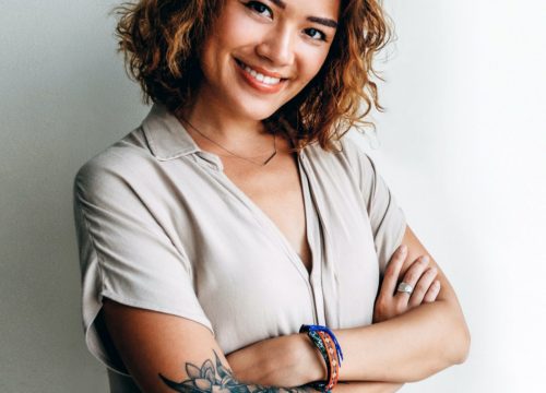 Woman with an arm tattoo